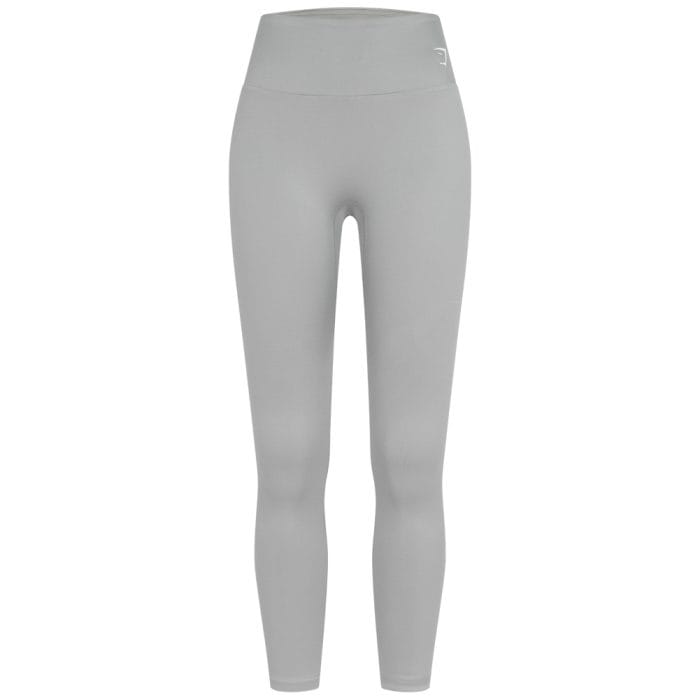 Legging de sport femme noir coupe longue, tissu haute densité et ceinture de maintien.
